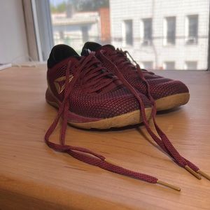 Red and gold athletic Reebok women’s CrossFit. Size 6.5 US